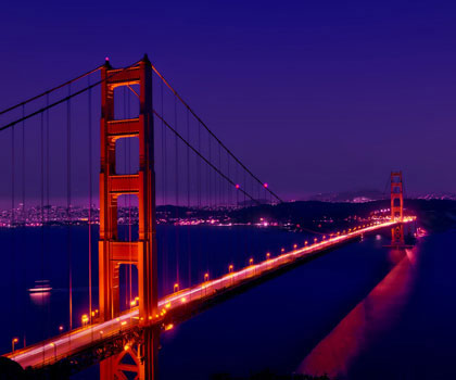golden gate bridge glowing at dusk