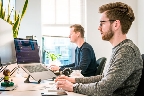 focused developers working at desks
