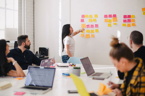 team brainstorming with sticky notes