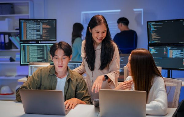 developers collaborating in modern workspace